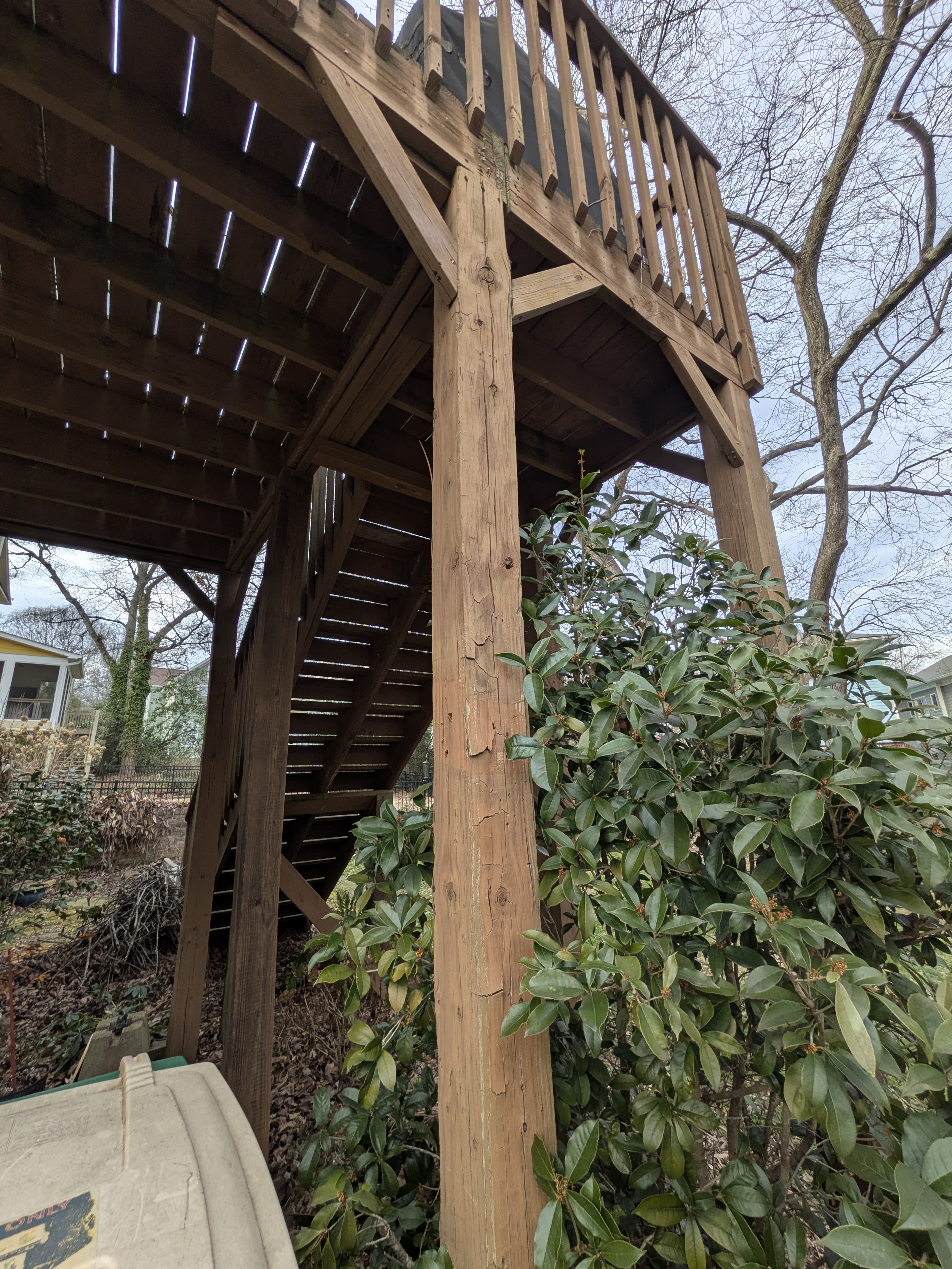 Inspecting wooden deck joists for rot in Normaltown Athens